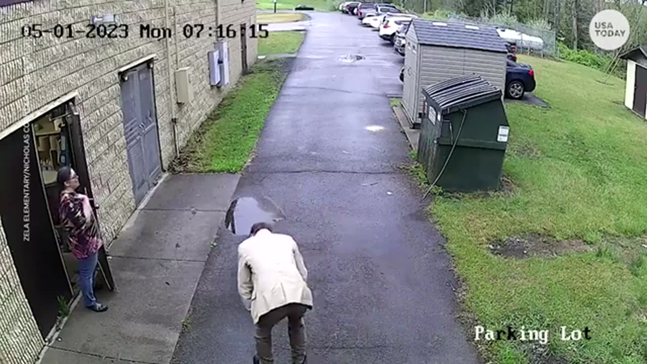 Bearinside elementary school trash dumpster startles principal I USA