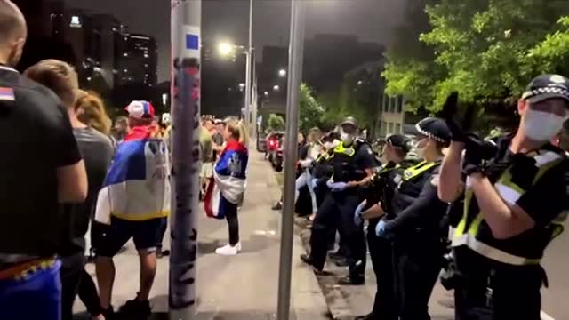 Novak Djokovic supporters dance outside his hotel