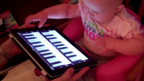 Cute Baby Expressions Towards Electronic Devices