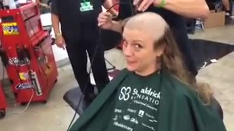 Woman headshave and buzzed from the charity !!!