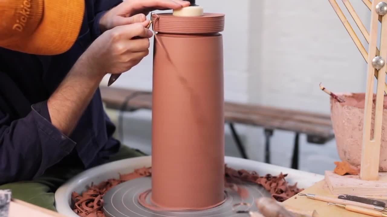 The Trimming Of The Top Of A Pottery Pot