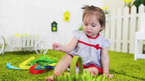 Happy little baby boy in his room, portrait