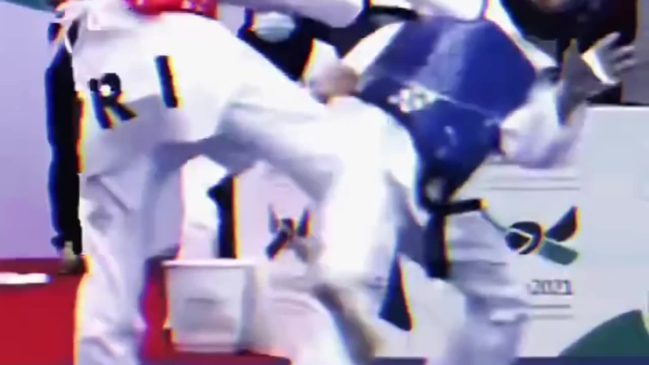 Taekwondo fighters perform a face kick with clarity 🥊💥🥋