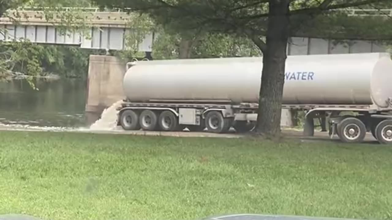 Watch is this truck dumps ‘something’ into the Grand River, in Grand Rapids Michigan?