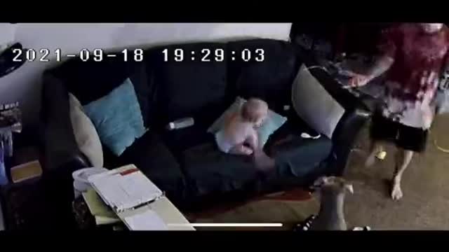 Dad Reflexes Kick in for Son on Couch