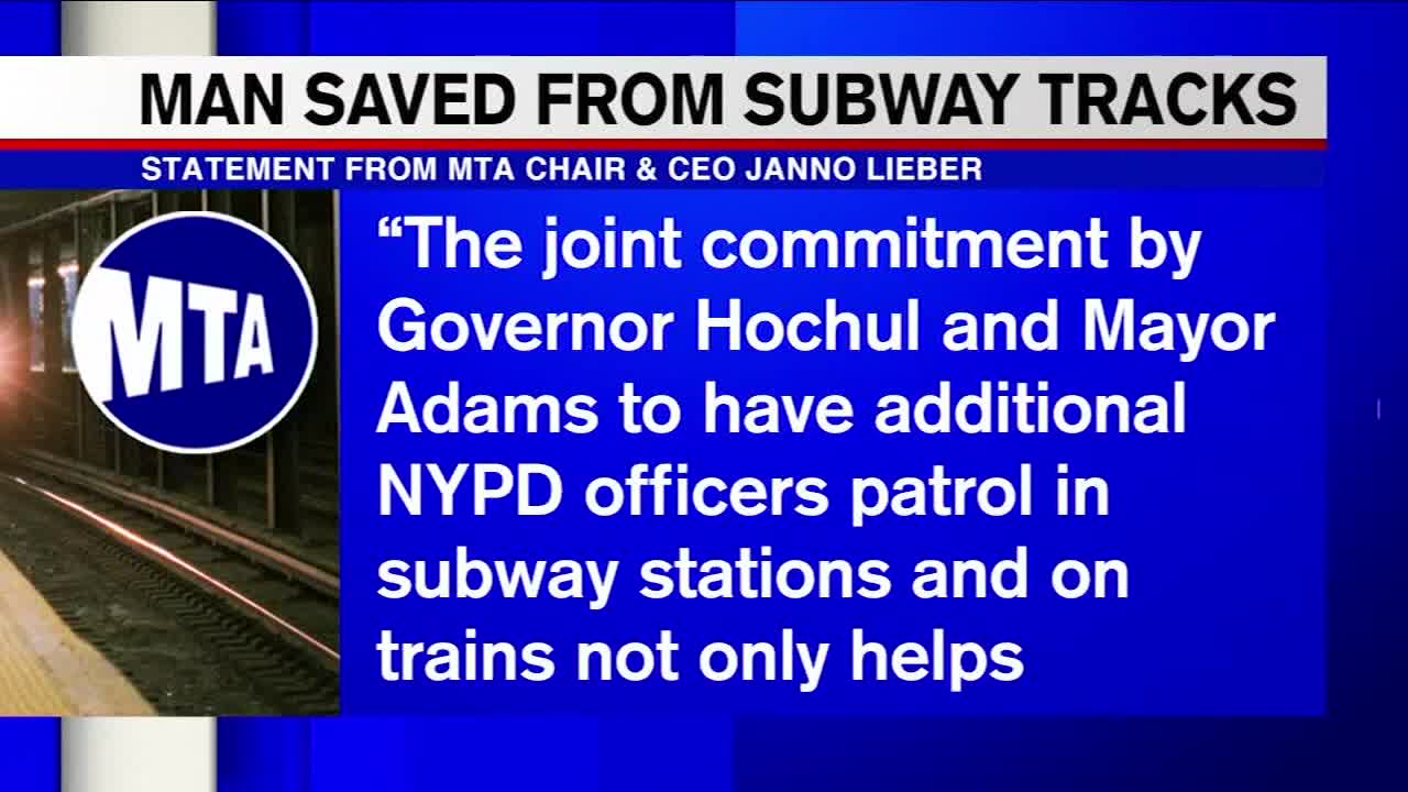 Police officers, good Samaritan pull man from subway tracks as train nears station