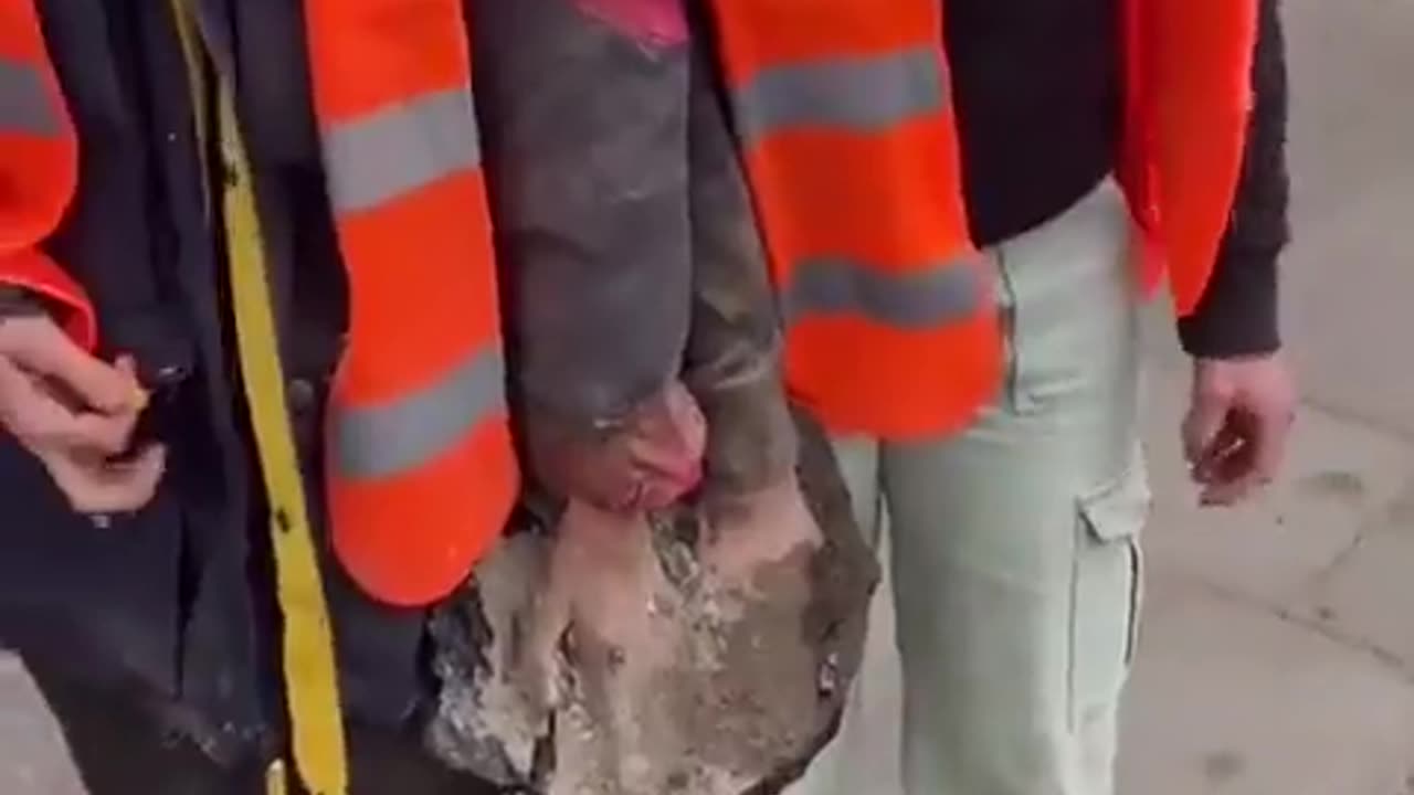 Climate activists glue hands to asphalt