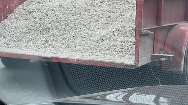 Guy Comments on Trailer Full of Gravel