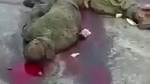 Georgian Mercinaries cutting throat of Russian POWs