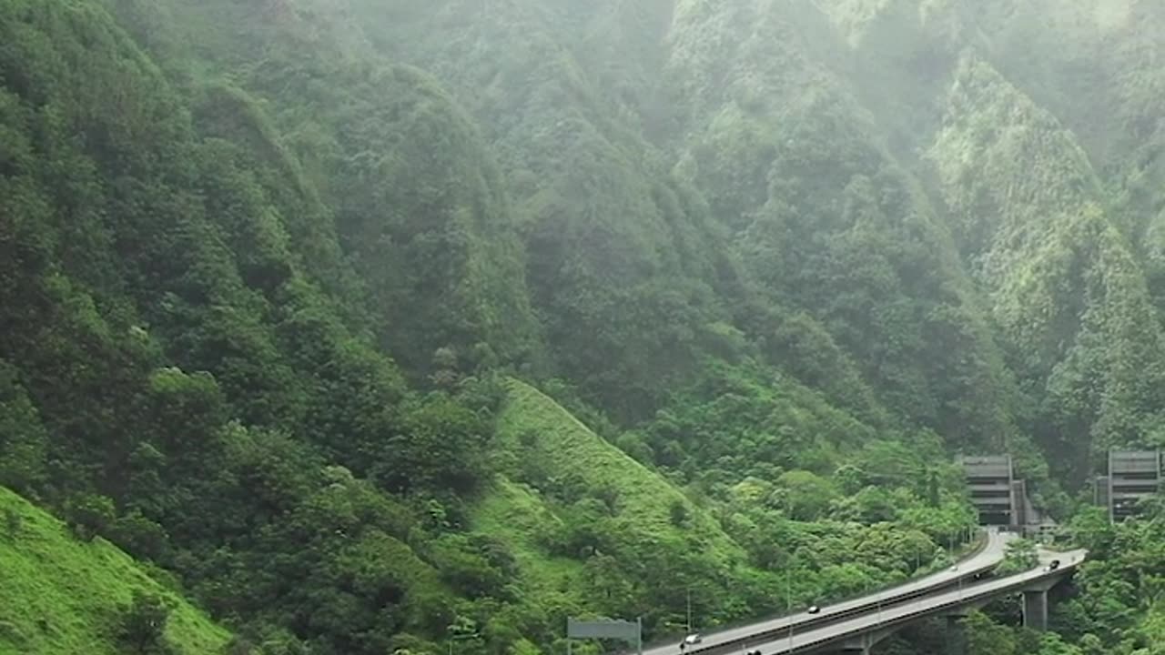 An Elevated Highway In The Mountain Valley In Hawaii