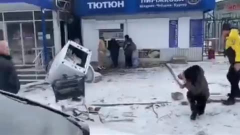 Ukraine Russia War Men beat up for assumed theft and looting in Ukraine