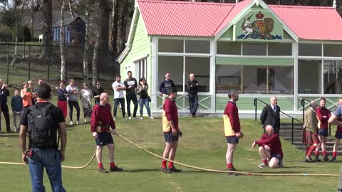 World's Strongest Men in a Tug o' War Challenge at Braemar Gathering Highland Games site in Scotland