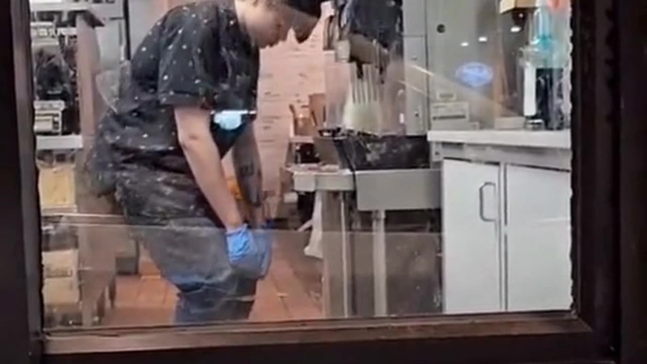 Worker At Taco Bell Is High On Something And Keeps Hitting Head