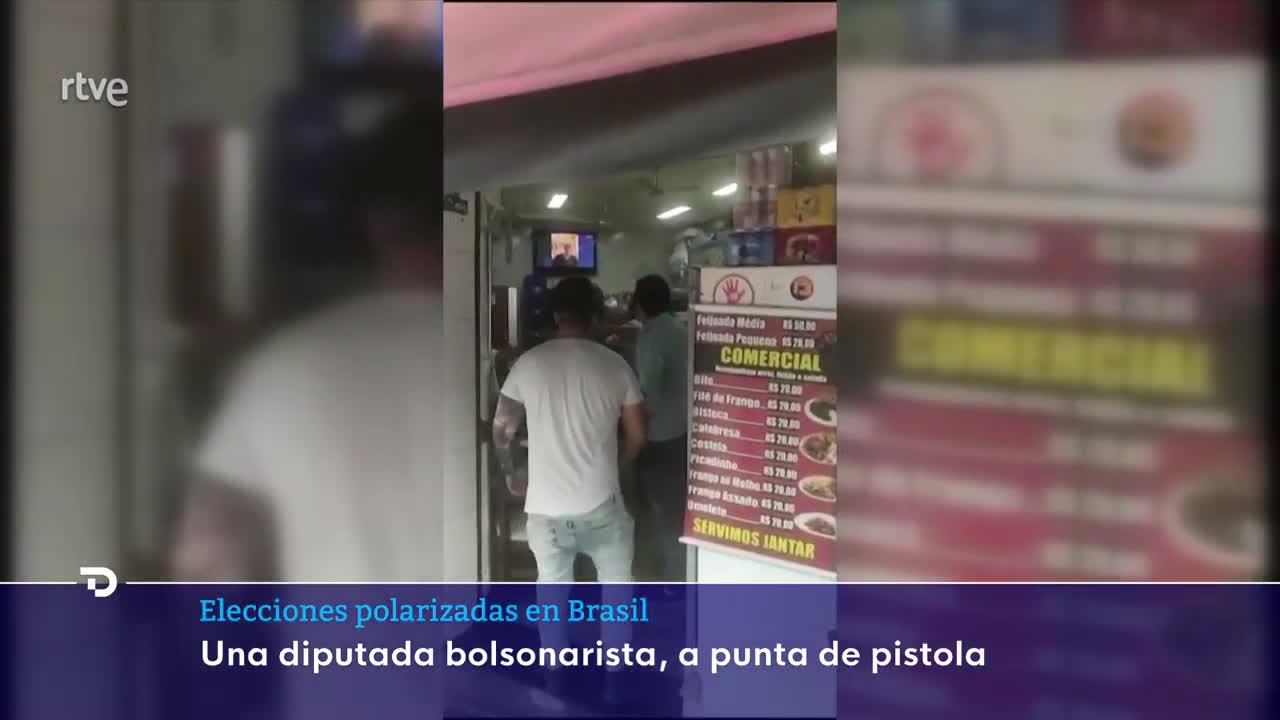 ELECCIONES BRASIL: Una DIPUTADA del partido de BOLSONARO APUNTA con un ARMA a un HOMBRE | RTVE