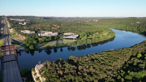 The Pennybacker Bridge of Highway 360 over Lake Austin and the surrounding Texas Hill Country.