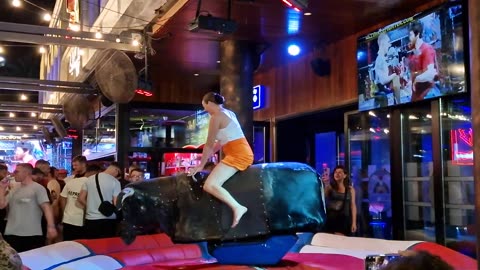 GIRL TAKE ON THE BULL! Benidorm Bull Ride. Mechanical Bull EPIC FAIL