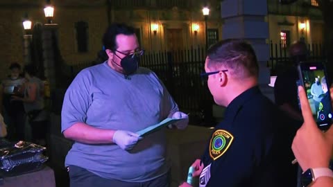 Volunteers feed homeless people fired by police in downtown Houston