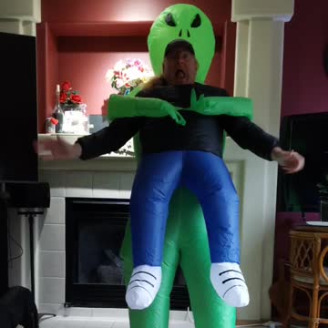 Halloween Alien Grabs and Walks Away with Small Scared Human