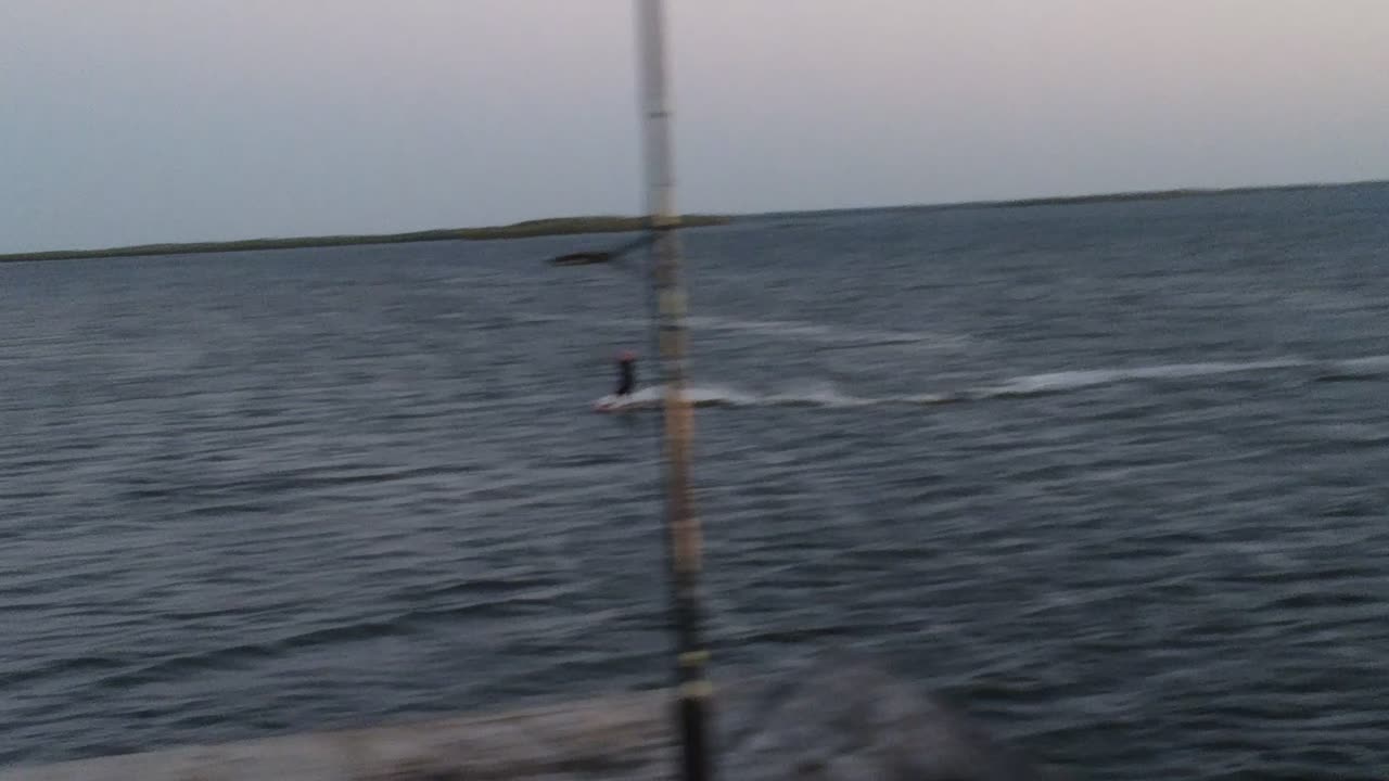 Some wind surfers