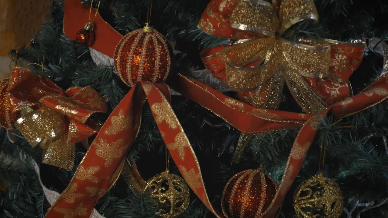 Christmas tree in a close shot of its branches and decorations