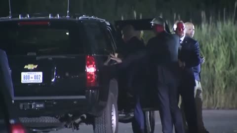 Biden Struggles To Get In A Car While Secret Service Shields Him From Cameras