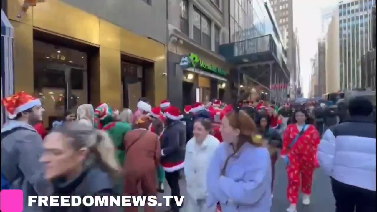 NYC, Happening Now: Hundreds of Santas lining up across Manhattan for