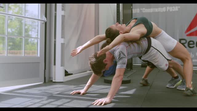 Couple Doing a Push Up