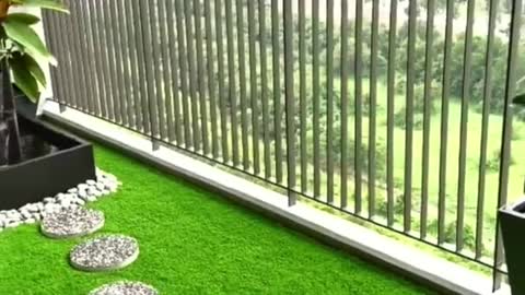 Balcony Design with fountain and Artificial Grass