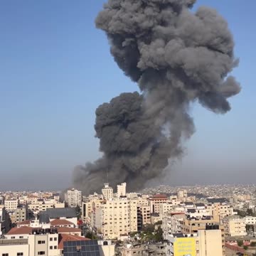 Israeli airstrike on a whole neighbor in the middle of Gaza city.