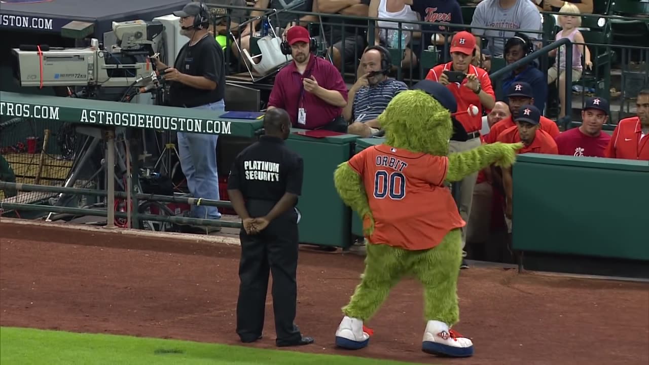 Dancing Man and cute Bear on the cricket ground