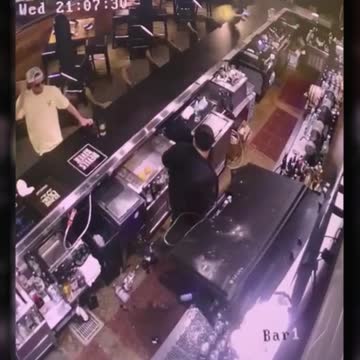 terrifying CCTV of television falling on bartender.. what happened? #shorts