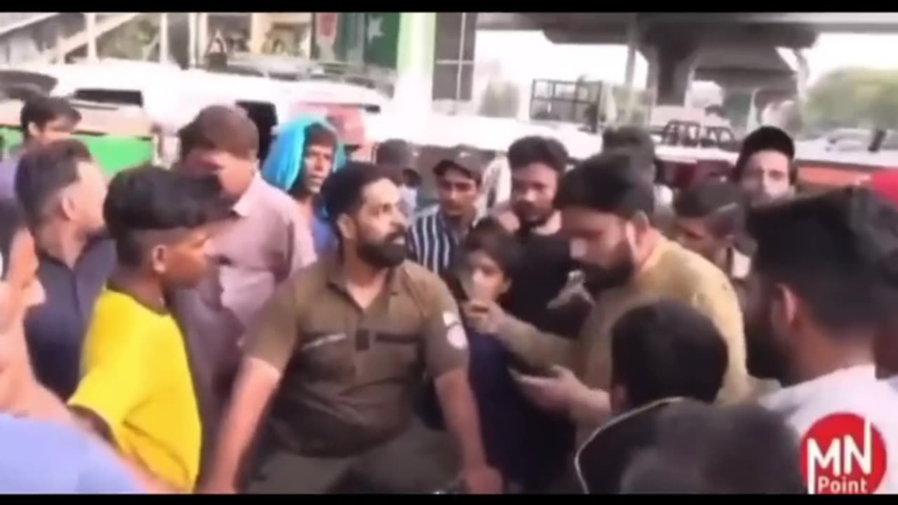 police man attack on camra man