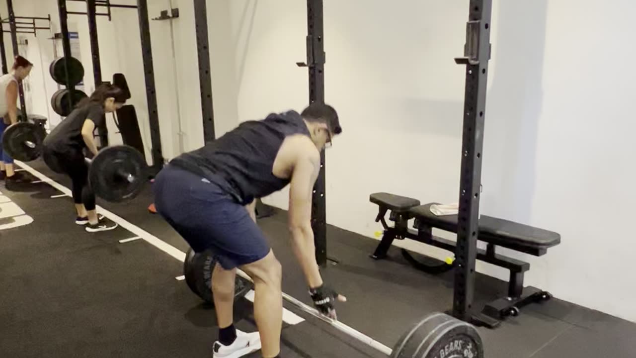 65 kg bent-over rows (100 % of body weight)