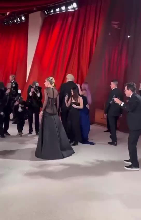 Lady Gaga Looks Appalled After She Gets an Ass Pat at Oscars While Wearing Ass-less Dress