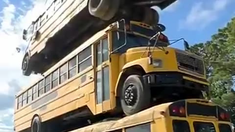 How Many School Buses Can We Stack?