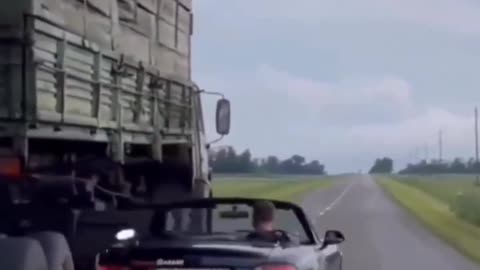 Roadies escaping below truck