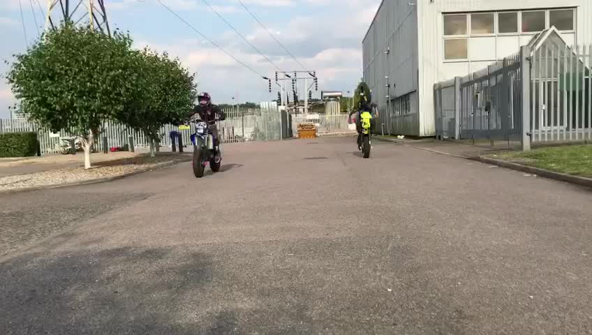 Izzy doing 12 o'clock wheelies