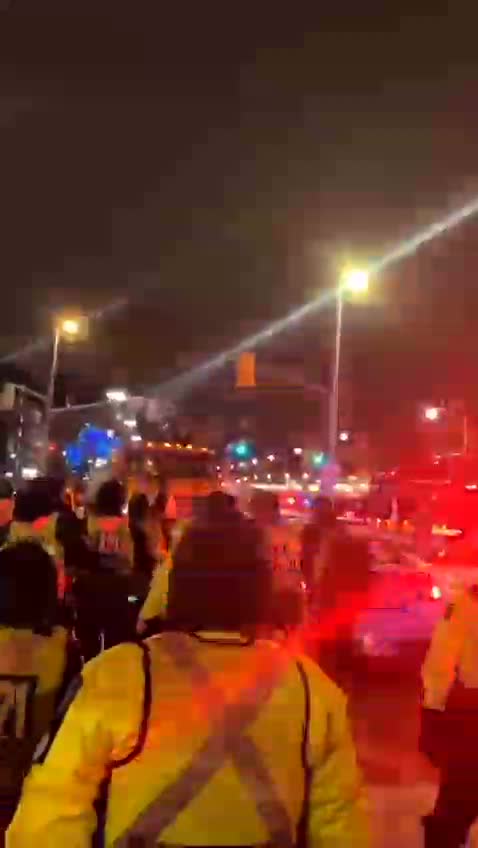 The police in Ottawa try to blockade but the people push them back.
