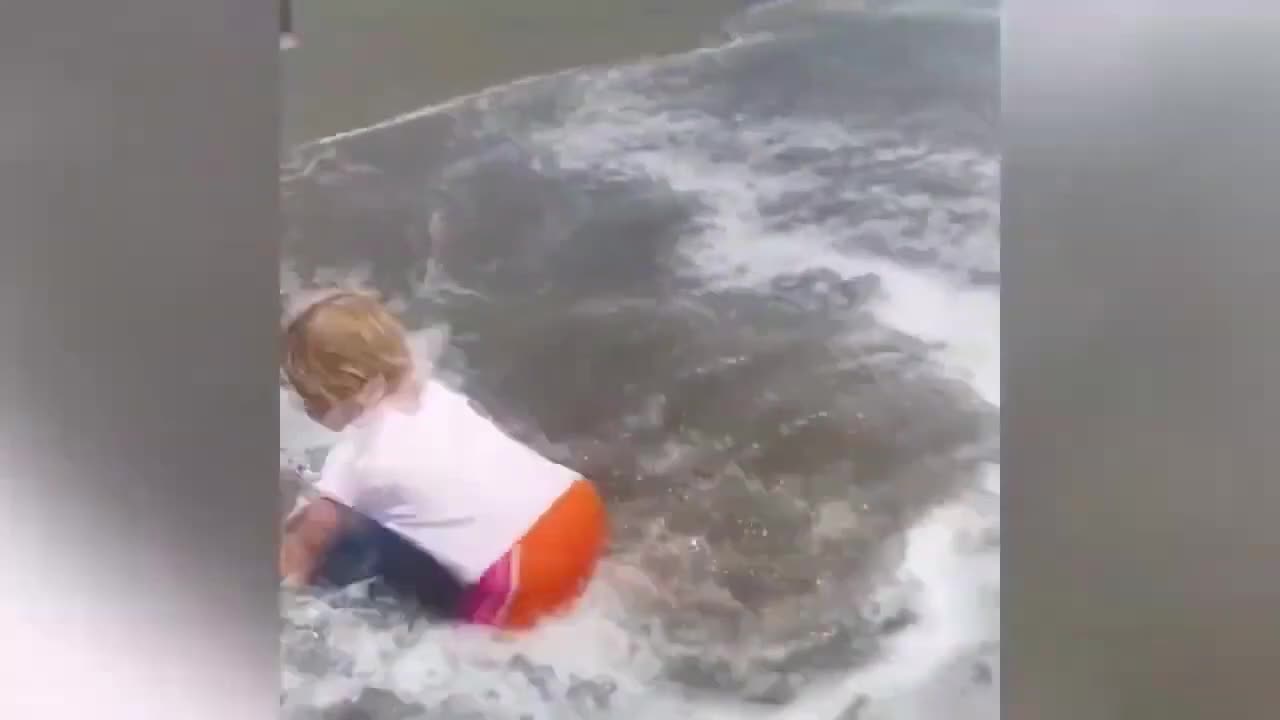 CHILDREN HAVING FUN ON THE BEACH 3