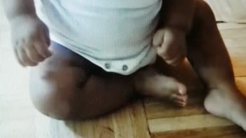 Funny cat opens door for baby.