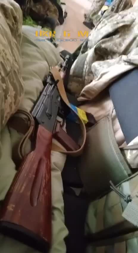 Ukraine soldiers using a school as shelter and to store weapons