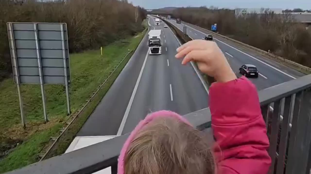 Little girl who loves trucks