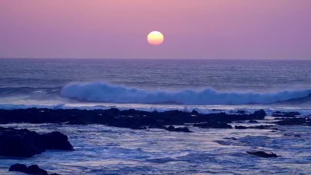 The sea at sunset and the colors of the sky