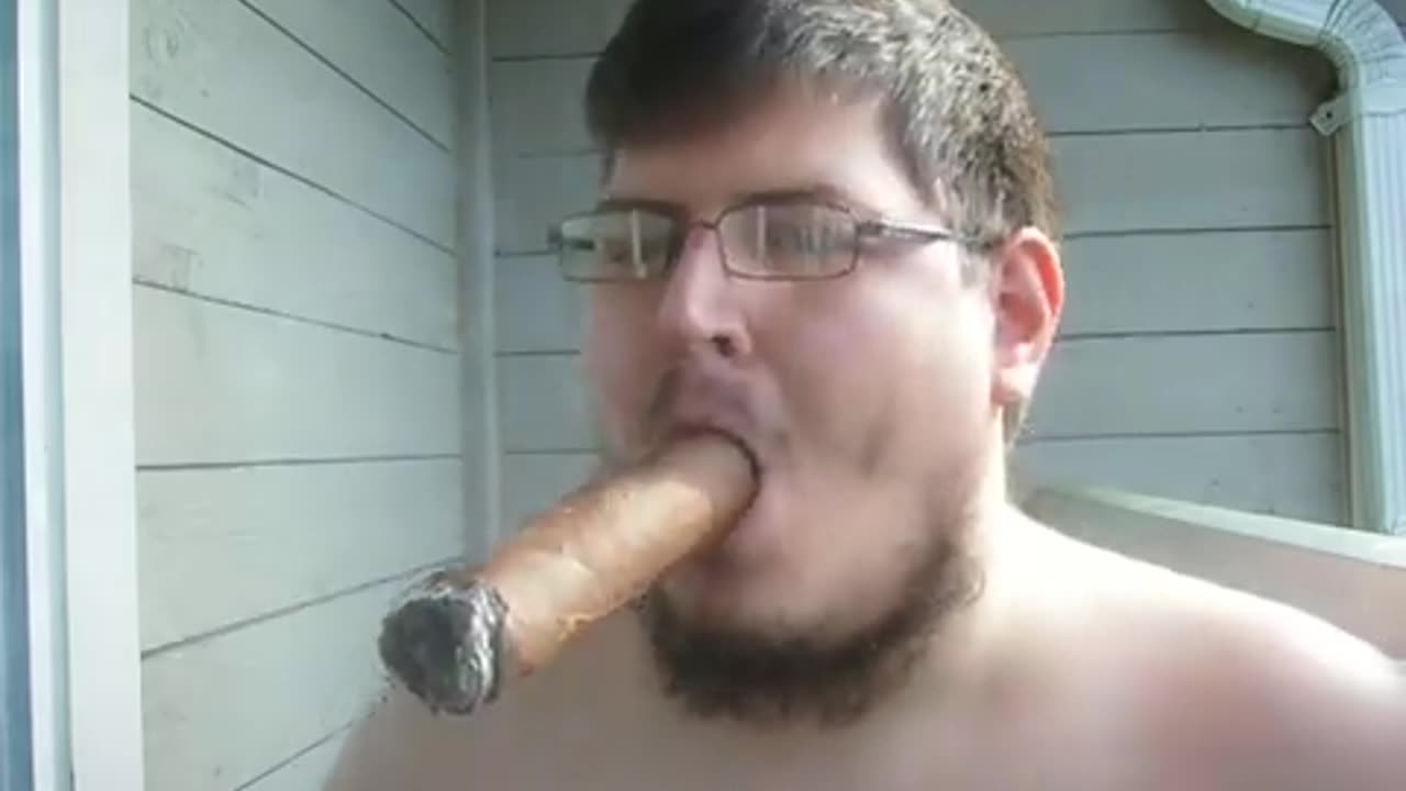 relaxing video of a white dude smoking a cigar