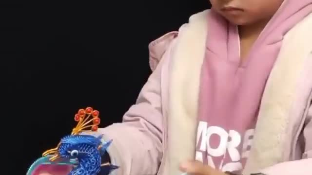 AMAZING KID MAKES IRON MADE PEACOCK