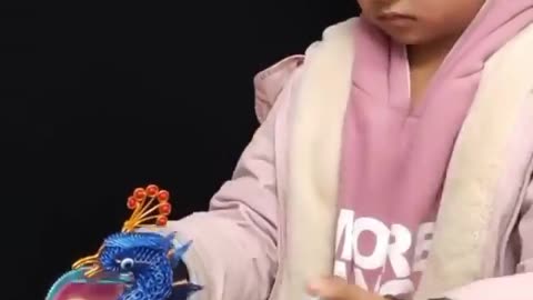 AMAZING KID MAKES IRON MADE PEACOCK