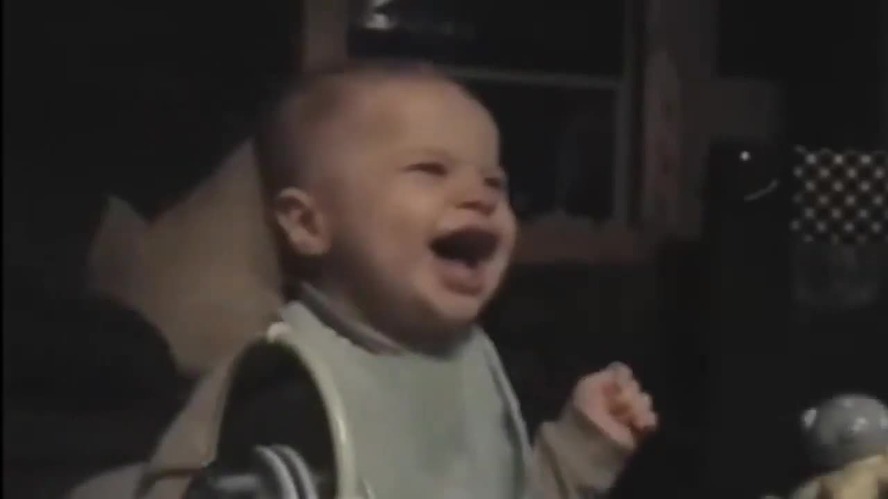 Baby laughing out of dads jokes