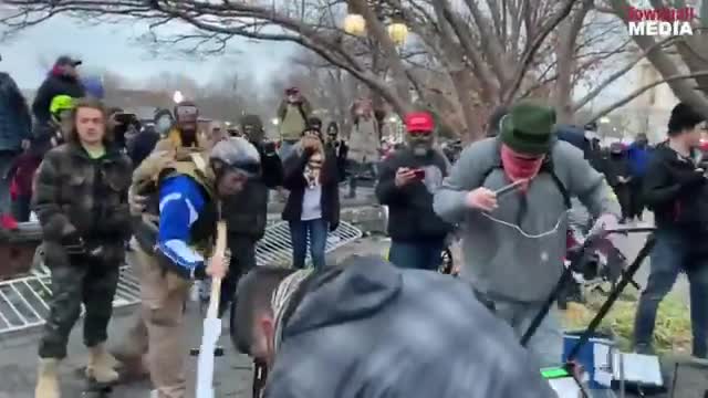Protesters Damaging Media Area