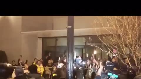 One Side Sings the National Anthem. The other side flips off America. Which side are you on?