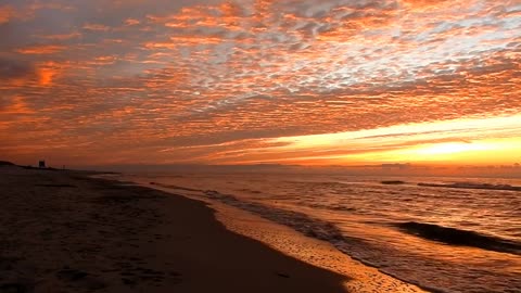 Beautiful sunset with an amazing burnt orange colored sky.